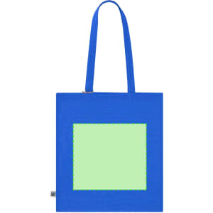 A blue tote bag with a large green square design in the centre. It has long handles and features a logo.