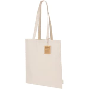A neutral-coloured tote bag with long handles and a tag attached. Features a simple design with a logo.