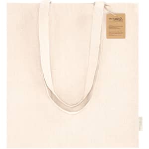 A cream-coloured tote bag with long handles, featuring a tag and a logo on the side.