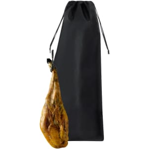 A black storage bag with a drawstring, holding a whole cured ham. The design features minimal branding.