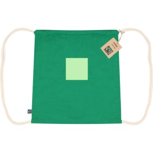 A green drawstring bag with a pastel square design and a tag, featuring a branding logo.