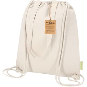 A cream drawstring cooler bag made from recycled materials, featuring a tag and a logo.