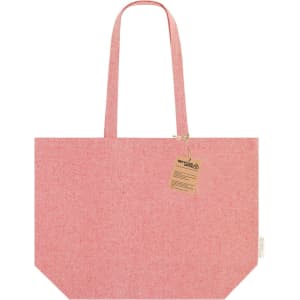 A pink tote bag with two handles, featuring a tag and a subtle texture. It has a simple design without detailed embellishments.