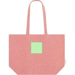 A pink tote bag with two handles and a square patch area, featuring a logo or branding.
