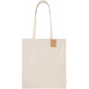 A beige tote bag with long handles, featuring a small tag and a simple design.