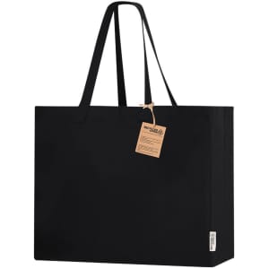 A large black tote bag with two long handles and a tag attached, featuring a brand logo.