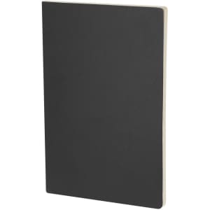 A black notebook with a plain cover and no visible markings or designs, featuring a cream inner page edge.