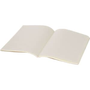 An open Atrex Notebook with lined pages, featuring a cream colour and a simple design.