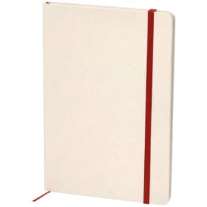 A cream notepad with a red elastic band and ribbon bookmark, featuring a simple design.