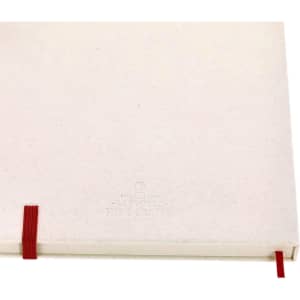 A white notepad with a textured cover, featuring a red elastic band closure and a subtle logo.
