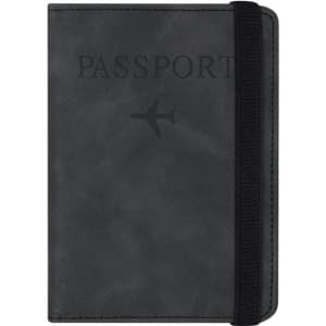 A black passport holder with an elastic band and an embossed design, featuring an airplane graphic and the word "PASSPORT."