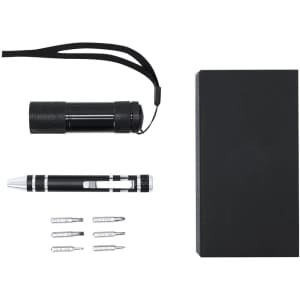 A black tool set featuring a flashlight, multi-tool pen, and various screwdriver bits, all in a sleek black box.