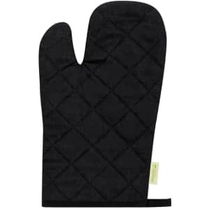 A black quilted kitchen mitten with a logo tag at the base, designed for heat protection.