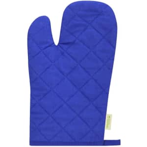 A blue quilted kitchen mitten with a thumb and a hanging loop, featuring a small branded tag.