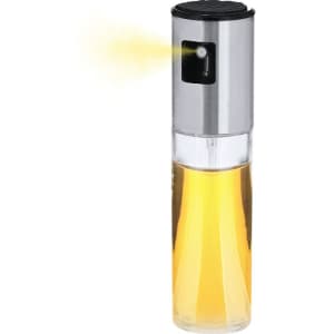 A metallic oil sprayer with a clear glass container, filled with golden oil, featuring a spray nozzle at the top.