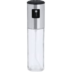 A transparent oil sprayer with a stainless steel top and a black lid, designed for home use.