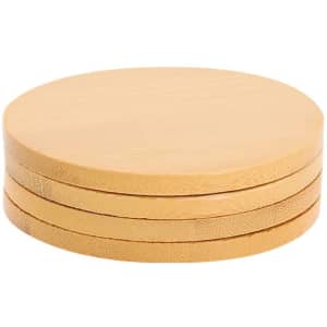 A set of four round bamboo coasters stacked together, showcasing a light brown colour with a textured surface.