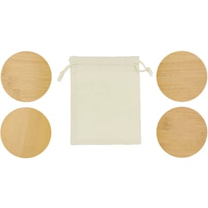 A set of four round bamboo coasters arranged around a cream-coloured drawstring pouch.