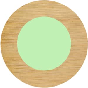 A round coaster with a bamboo edge and a soft green centre, featuring a logo.