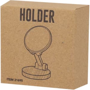 A brown cardboard box containing a round phone holder design, featuring a branding logo on the front.
