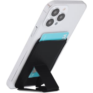 A black card holder stand attached to a white phone, holding a card in an upright position.