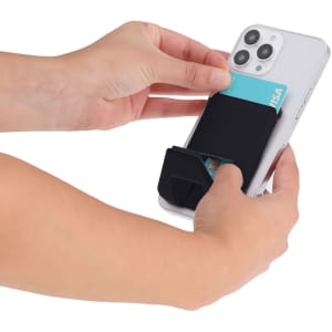 A black card holder stand is being attached to a smartphone, demonstrating its functionality.