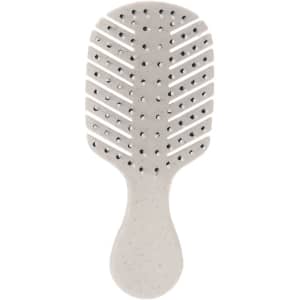 A grey hairbrush with a wide, vented design and a sturdy handle, featuring an ergonomic shape.