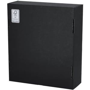 A black gift box with a textured finish, featuring a logo and a label on the front.