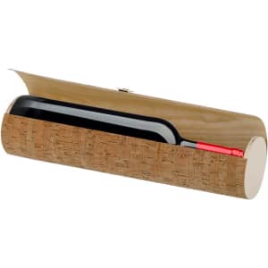 A wooden gift box with a cork finish containing a dark drink bottle with a red cap.