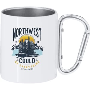 A white mug with a metallic handle, featuring a mountain and forest graphic design.