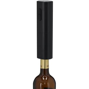 A black electric corkscrew positioned over a brown wine bottle, featuring a simple button on its side.