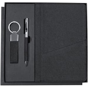 A black gift set featuring a notebook, pen, and keyring, all elegantly presented in a matching box.
