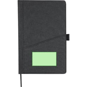 A black notebook with a green accent, featuring an elastic closure and a placeholder for a label.