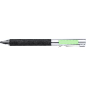A black pen with a textured grip, chrome accents, and a green highlight on the barrel. It features a logo on the clip.