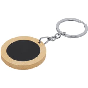 A round bamboo keyring with a black circular centre and a silver metal chain.