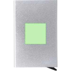 A silver business card holder featuring a green highlighted area and a black ribbon bookmark.