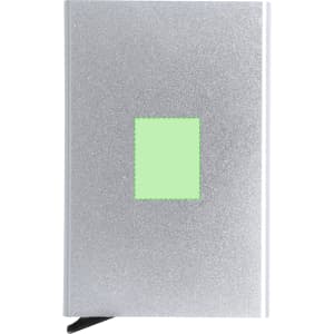 A silver card holder with a textured green square on the front and a black tab at the bottom.