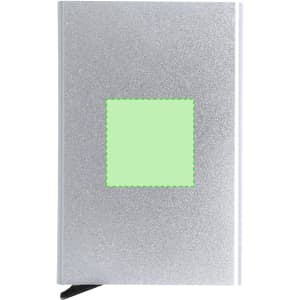 A silver business card holder with a square green area on the front, featuring a logo.