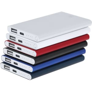 A stack of five power banks in white, red, blue, and black, with USB ports and indicator lights.