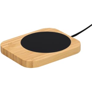 A bamboo cup warmer with a black heating surface and a power cable, designed for home use.
