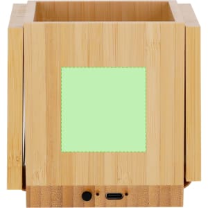 A bamboo pencil holder with a light green panel and a base featuring ports. It has a simple, minimalist design.