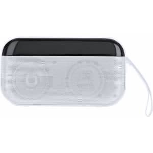 A white and black portable speaker with a textured surface and a carrying strap, featuring dual speaker sections.