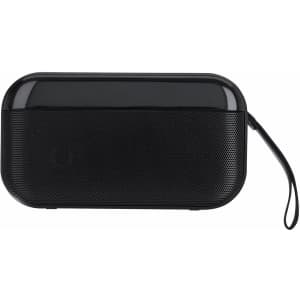 A black portable speaker with a sleek design and textured surface, featuring a carrying strap.