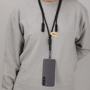 A grey charging cable holder worn around the neck, featuring a black cord and a smartphone attached.