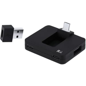 A black USB hub with multiple ports, including USB-C and USB-A connections, and an attached adapter.