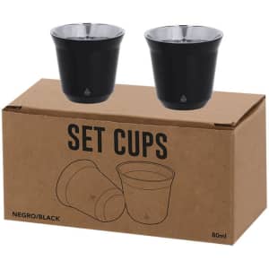 A set of two black cups with metallic interior, displayed on a cardboard box labelled "Set Cups."