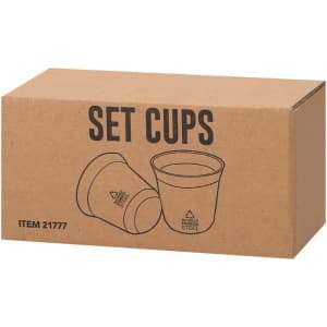 A set of stainless steel cups in a cardboard box, featuring a simple design and a logo.