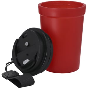 A red plastic cup with a black lid and strap, designed for drinkware use.