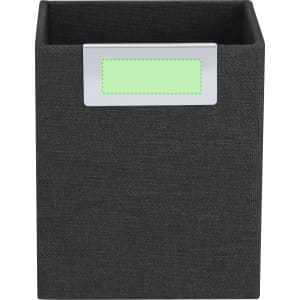 A black pencil holder with a rectangular label holder on the front, featuring a silver trim.