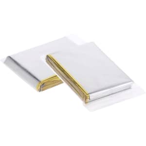 Two Mithak Space Blankets wrapped in plastic, featuring a silver surface with gold edges.
